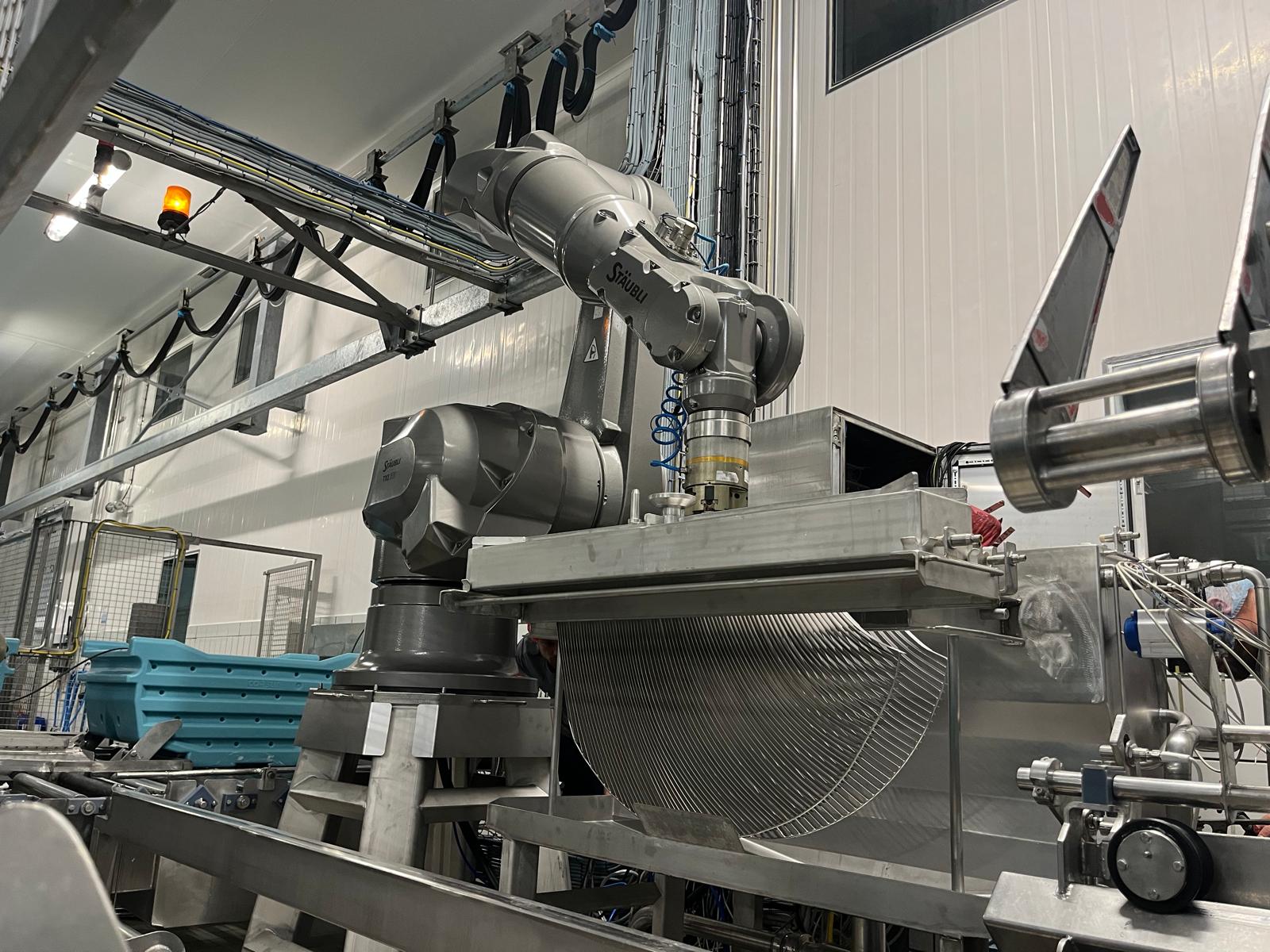 Îlot robotisé de tranchage de caillé