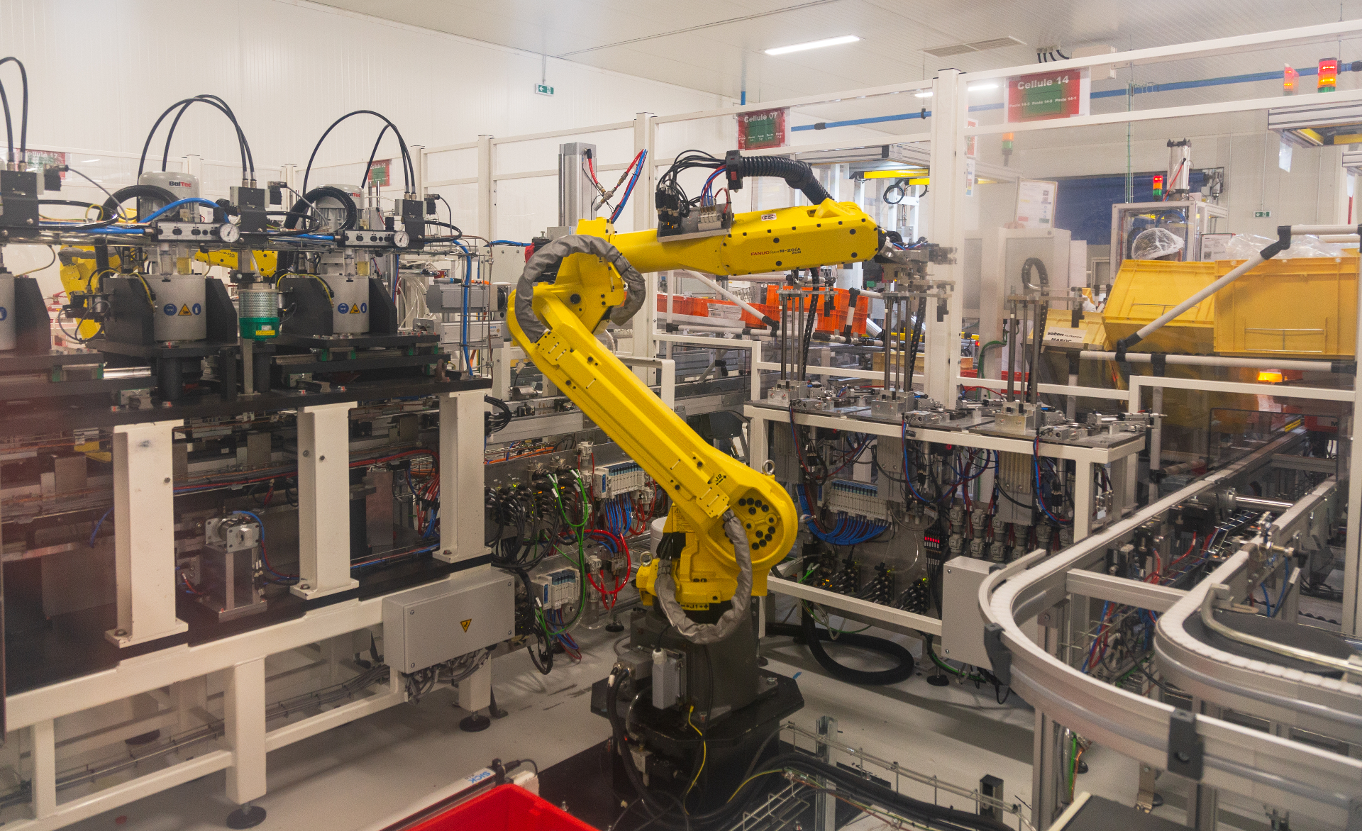 Ligne d'assemblage haute cadence avec robot FANUC